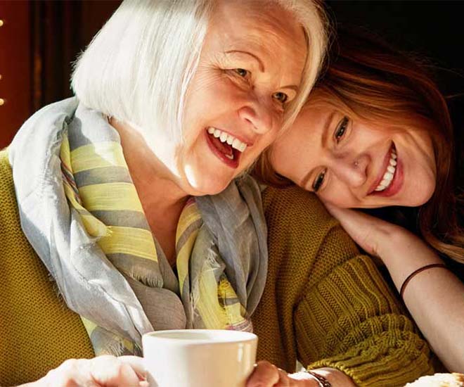 mother and daughter laughing together